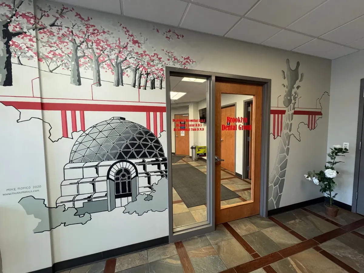 A hand-painted mural at the entrance of Brooklyn Dental Group